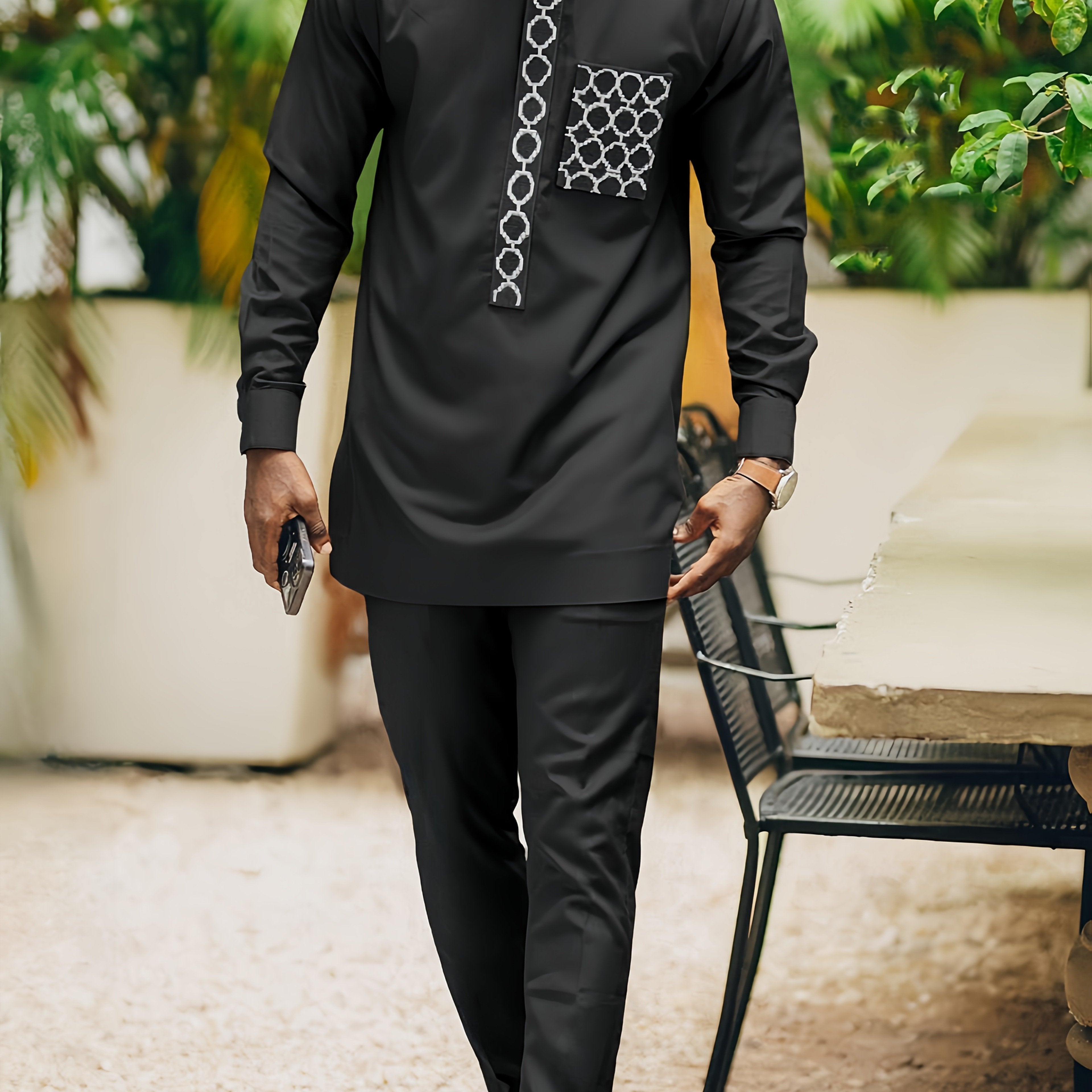 SHOWLU men's African Dashiki set with embroidered long sleeve top and matching pants, traditional and stylish clothing.
