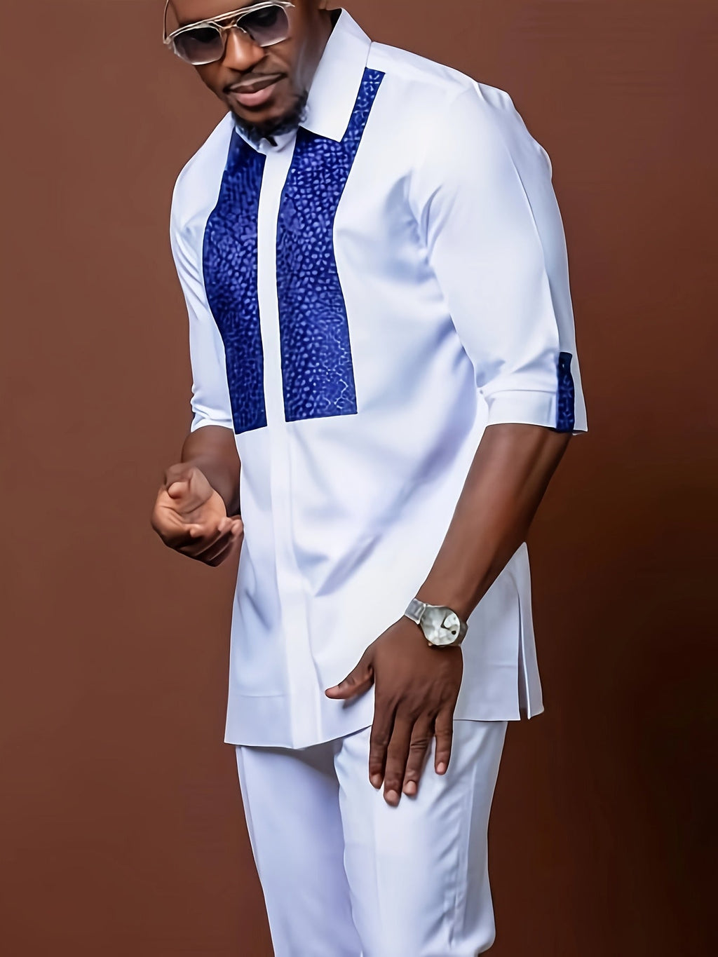 SHOWLU African ethnic print men's 2-piece shirt and pants suit set, featuring bold traditional patterns and vibrant colors.