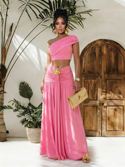 One-shoulder top and ruched maxi skirt set by Trendsi, featuring a stylish, coordinated fashion look with fitted top and flowing skirt.