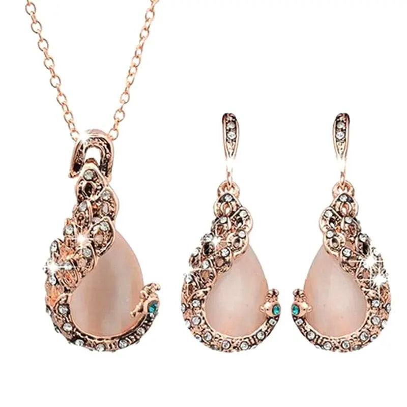 Elegant Showlu Fashion women's waterdrop rhinestone necklace and earrings jewelry set with pendant and hook earrings, stylish and sparkling.