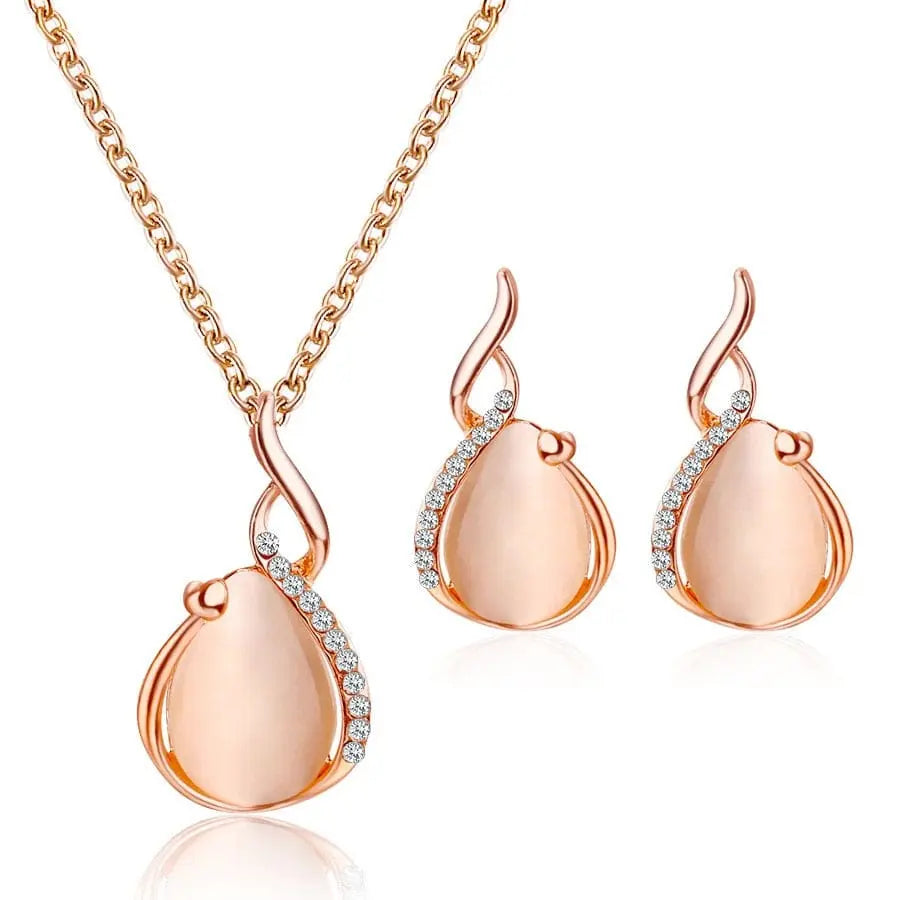 Elegant waterdrop rhinestone necklace and earrings set for women, featuring sparkling pendant and hook earrings by Showlu Fashion.