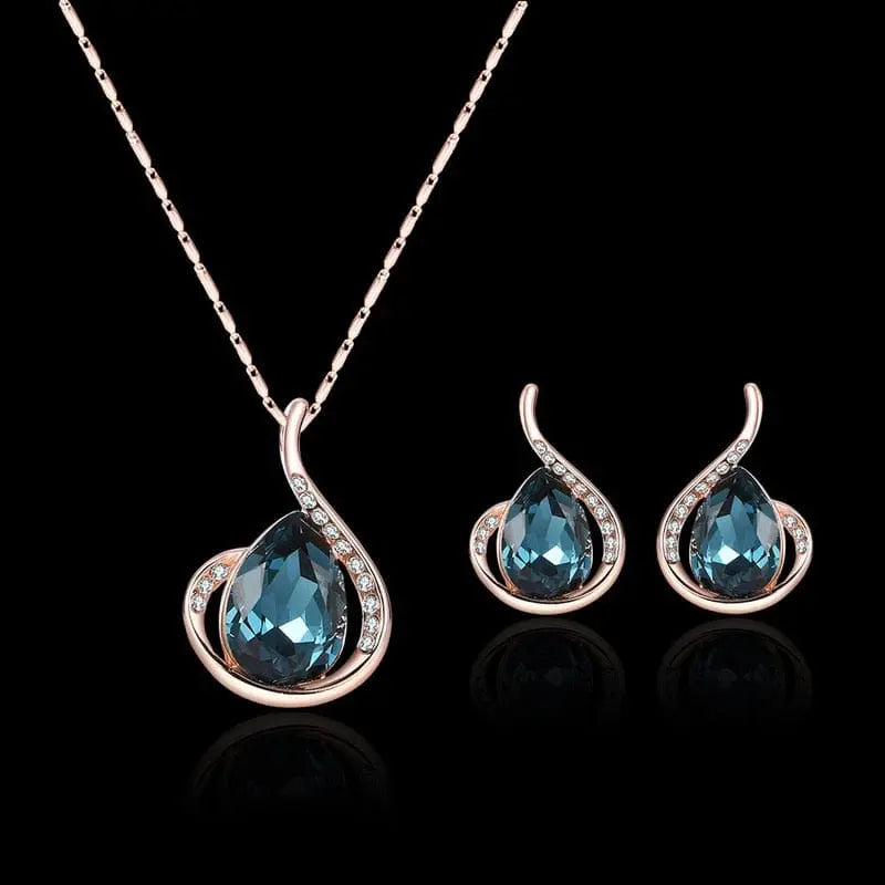 Elegant waterdrop rhinestone necklace and earrings set for women, featuring sparkling pendant and hook earrings by Showlu Fashion.