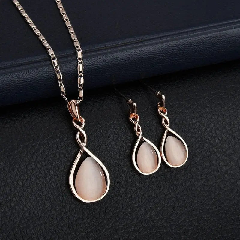 Showlu Fashion women's waterdrop rhinestone necklace and earrings jewelry set with elegant pendant and hook earrings, stylish and sparkling.