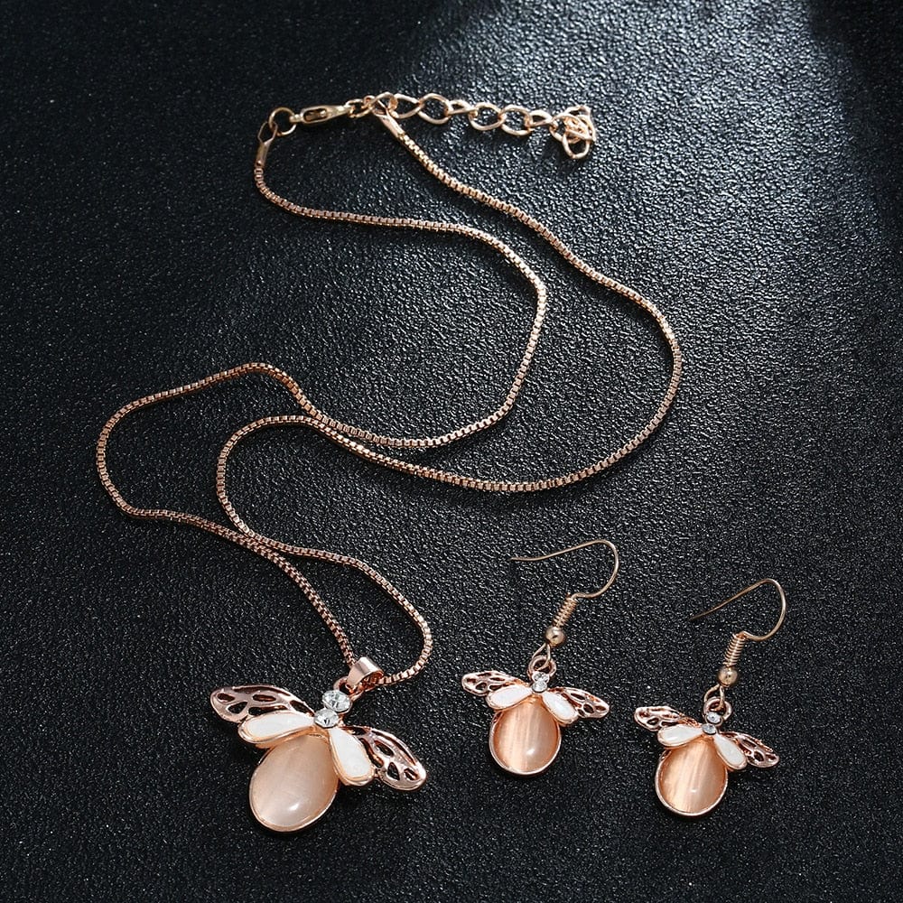 Elegant waterdrop rhinestone necklace and earrings set for women by Showlu Fashion, featuring sparkling pendants and hook earrings.