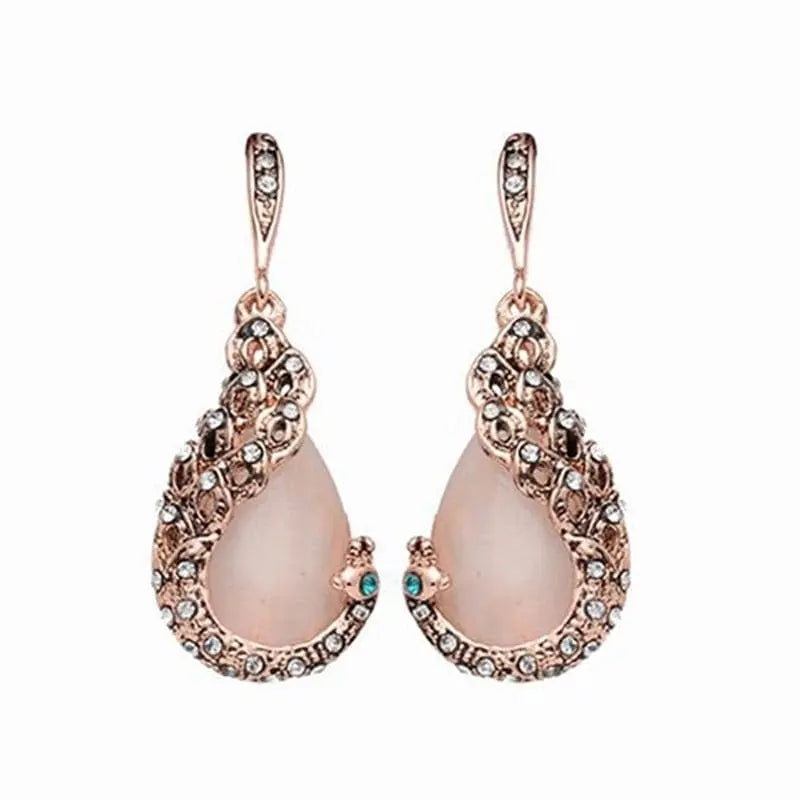 Showlu Fashion women's waterdrop rhinestone necklace and earrings set with elegant pendant and hook earrings, sparkling jewelry ensemble.