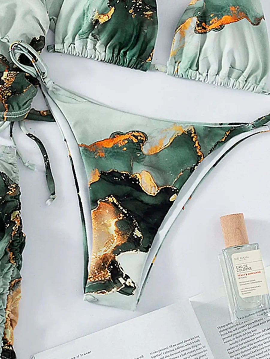 Lyric Women's 4-piece halter bikini set with marble print cover-up, perfect for summer beachwear and swimming.