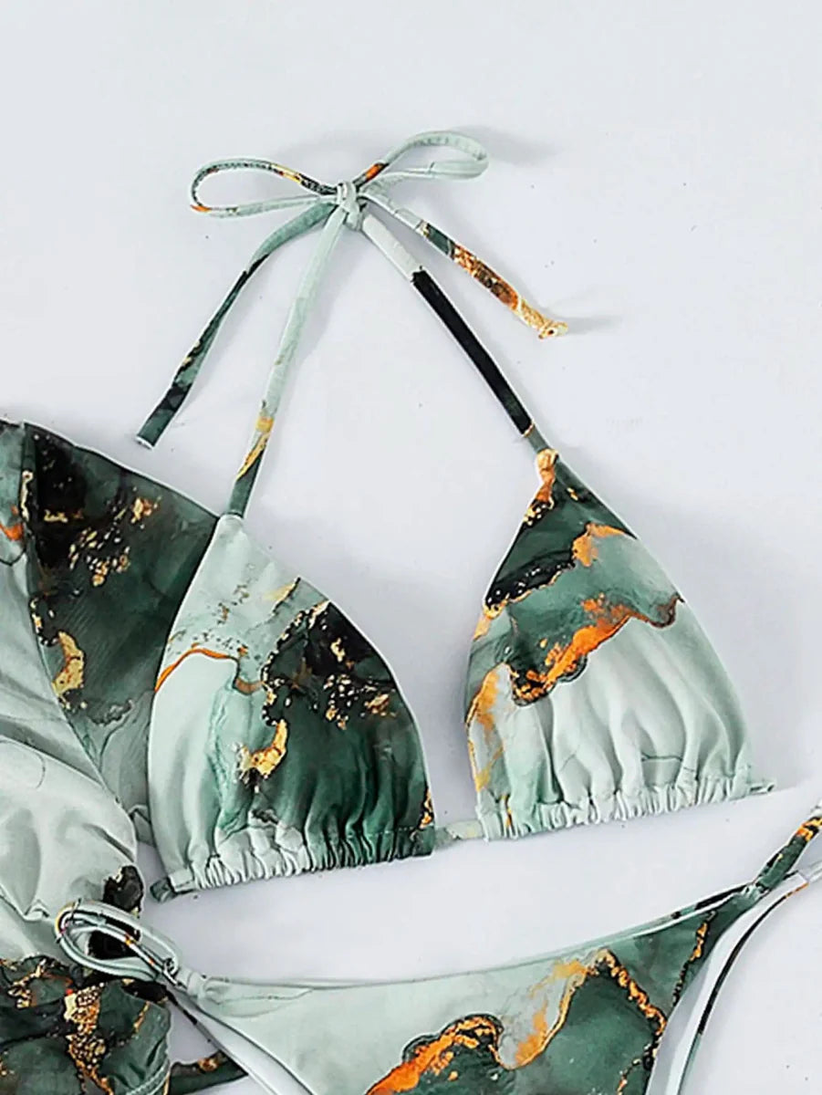 Lyric Women's 4-piece halter bikini set with marble print cover-up, stylish swimwear for women’s summer beachwear and swimming.