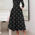 SHOWLU FASHION polka dot fit and flare dress with high neck and A-line silhouette, showcasing the stylish design and pattern.