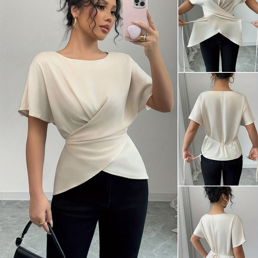 SHOWLU Women's off-shoulder asymmetrical hem blouse with short sleeves, stylish and lightweight for casual wear.