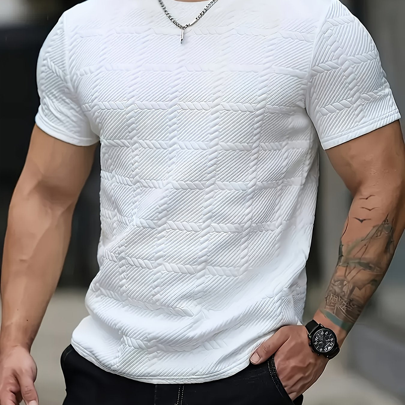SHOWLU Men's geometric jacquard knit T-shirt with casual round neck, featuring a patterned design in a close-up view.
