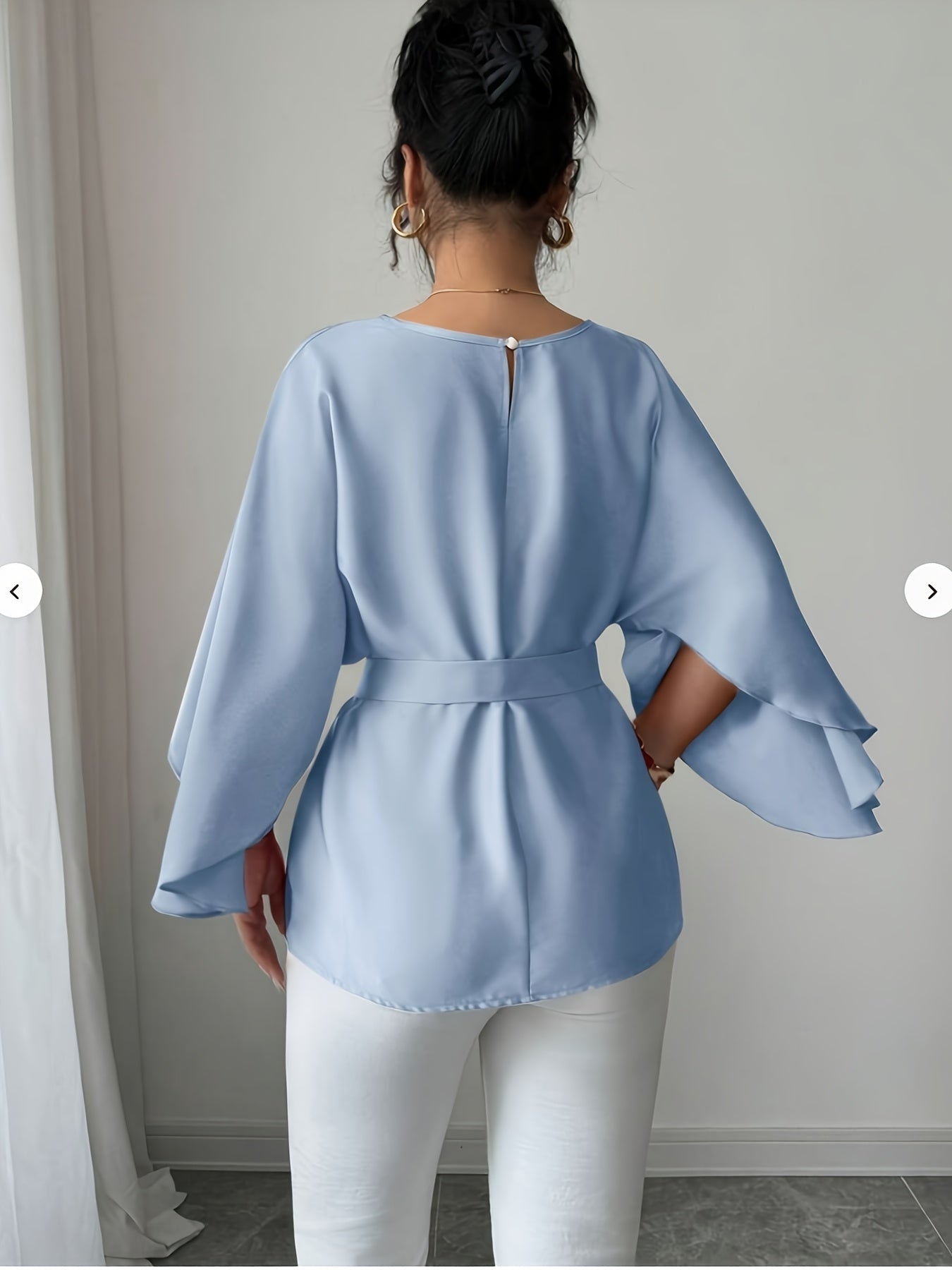 Light blue SHOWLU FASHION long sleeve belted blouse with crew neck, elegant and stylish for women.