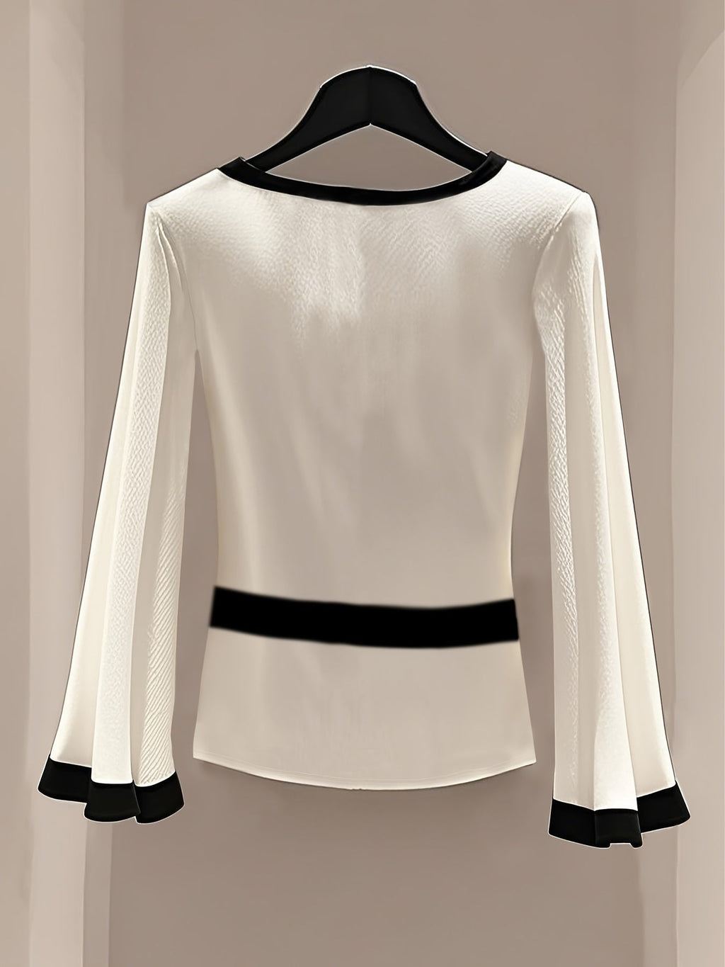 White Showlu Fashion round neck blouse with flared sleeves, knit fabric, stylish and comfortable women's top perfect for casual wear.