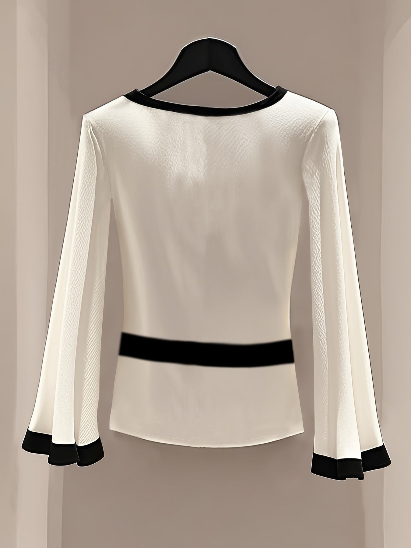 White Showlu Fashion round neck blouse with flared sleeves, knit fabric, stylish and comfortable women's top perfect for casual wear.