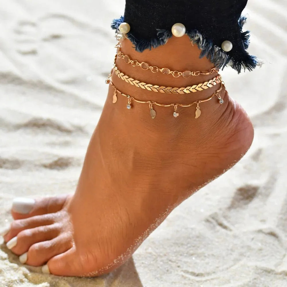 Set of four bohemia shell and crystal chain anklets for women, beach-ready ankle bracelets for summer and casual wear.