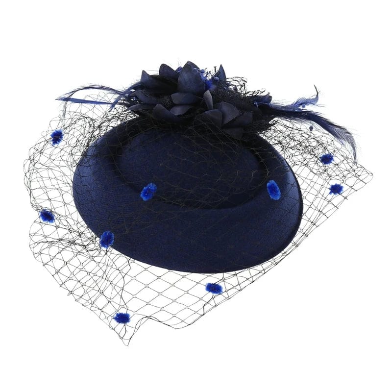 Women's fascinator hat by Showlu Fashion with feather flower design, veil, and pillbox style for elegant occasions and tea parties.