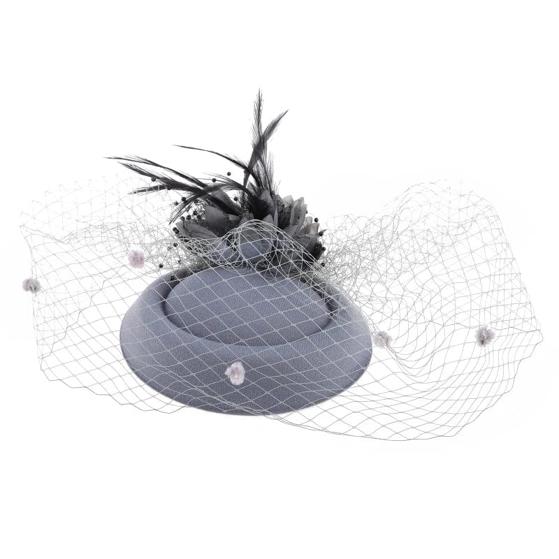 Women's fascinator hat by Showlu Fashion with feather flower, pillbox design, veil, ideal for tea parties and formal events.