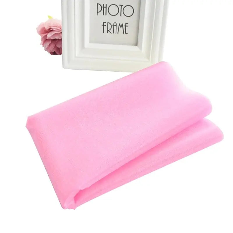 Sheer crystal organza tulle roll for wedding and party decor, showing fabric in 5 or 10 meters length, ideal for DIY wedding decorations.