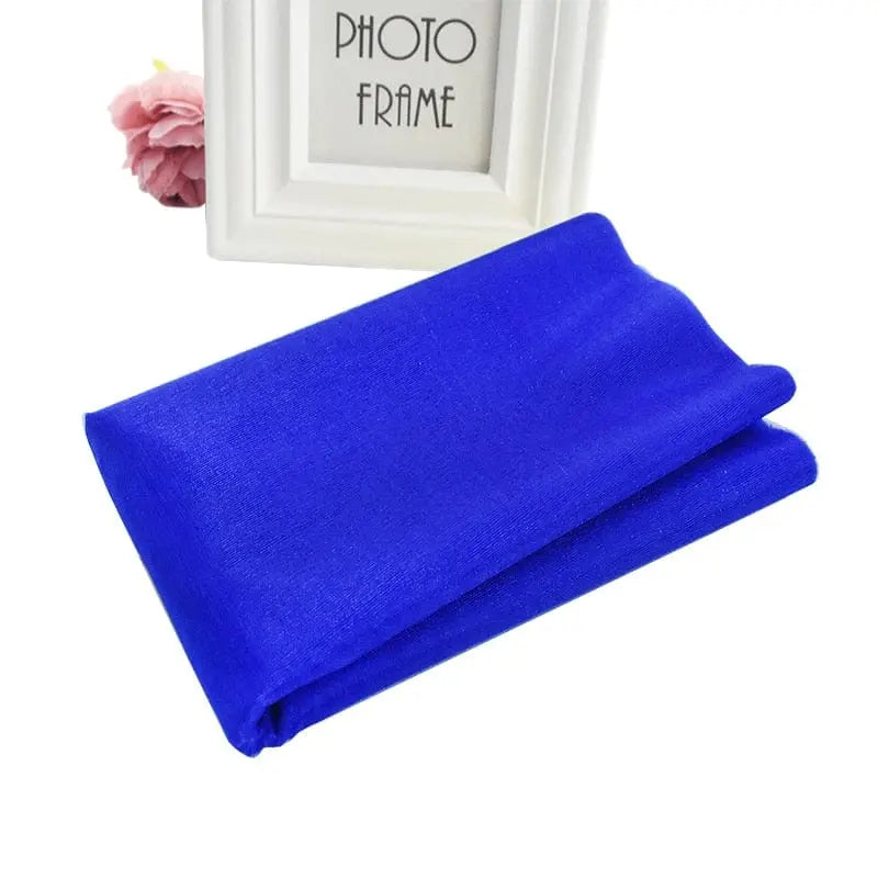 Sheer crystal organza tulle roll from Showlu Store Nation, ideal for wedding and party decor, backdrop, and chair sashes.