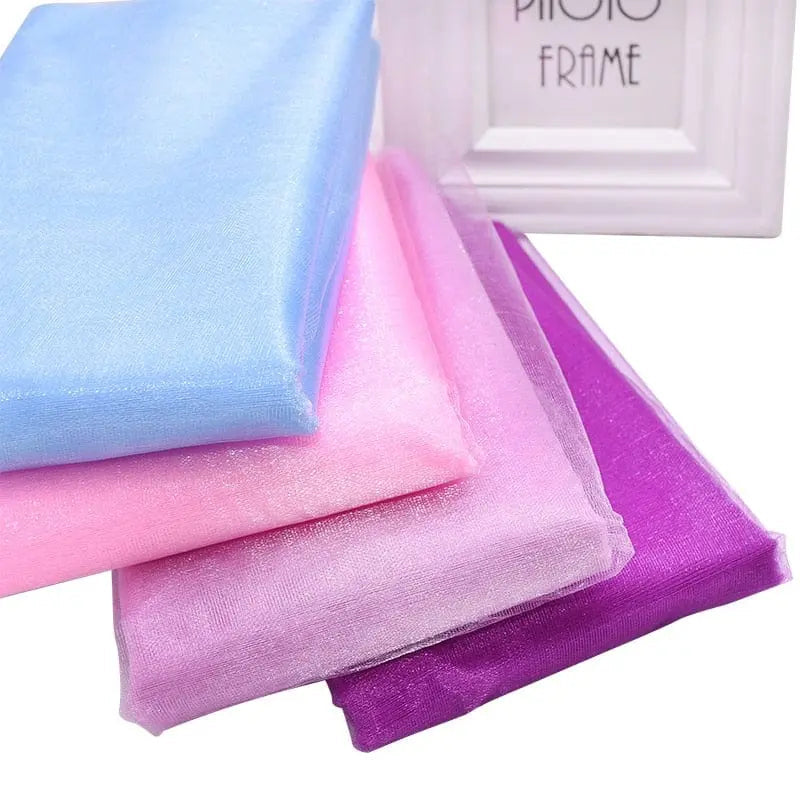 Sheer crystal organza tulle roll for wedding and party decor by Showlu Store Nation, 5 or 10 meters, perfect for backdrops and sashes.