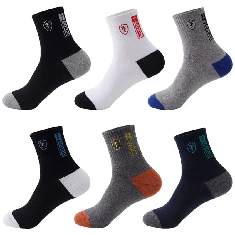 Set of five men's cotton sports socks by Showlu Fashion Store, breathable, sweat-absorbent crew socks for spring and fall.