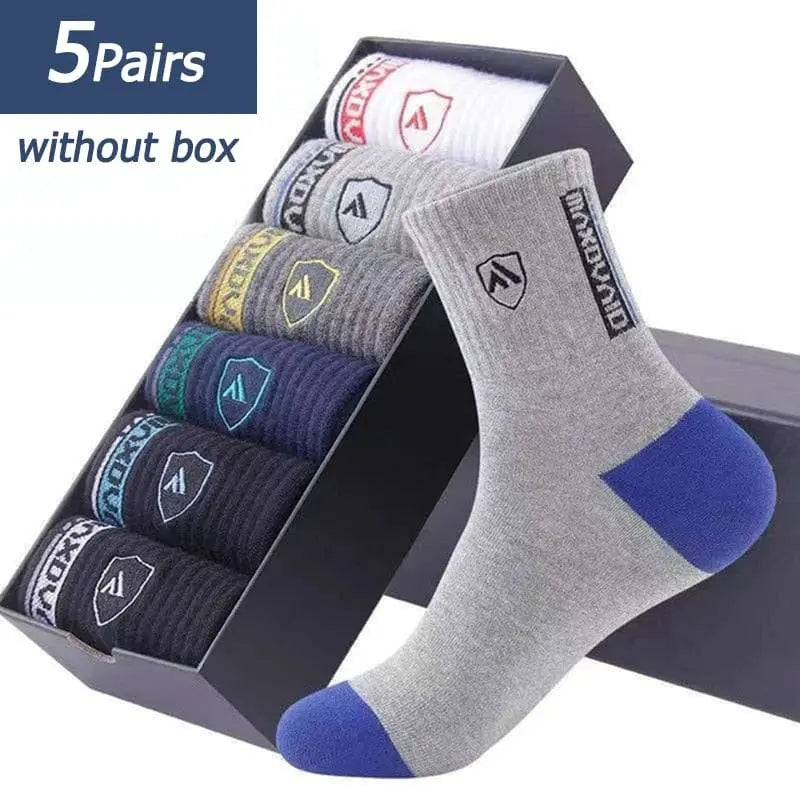 Set of five men's cotton sports socks from Showlu Fashion Store, breathable, sweat-absorbent, and comfortable crew socks for active wear.