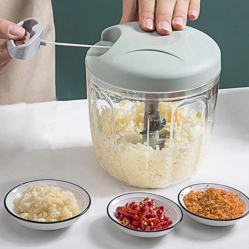 Showlu manual meat mincer and garlic chopper with 500/900ml capacity, featuring a rotating garlic press and vegetable cutter for kitchen use.