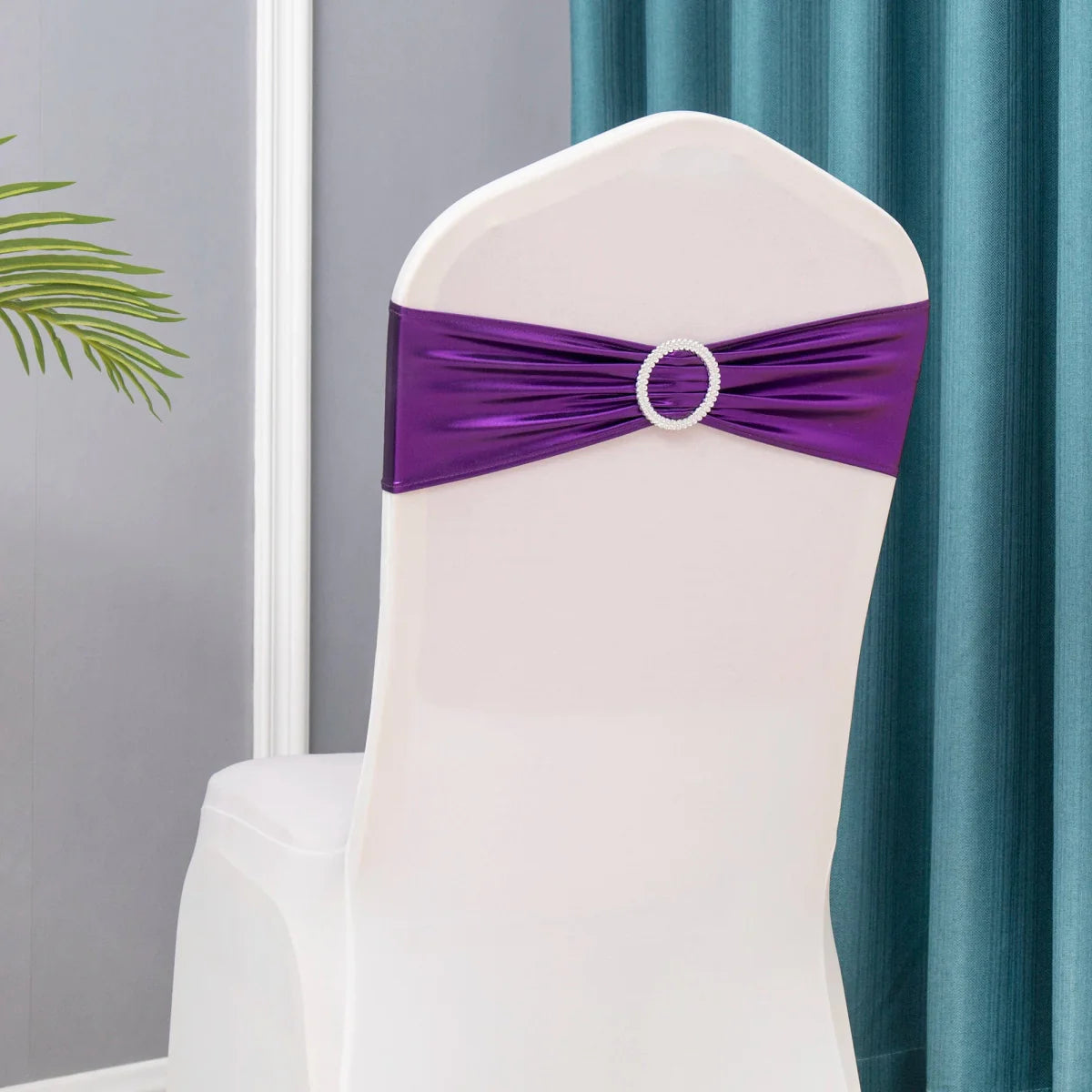 Set of 50 metallic gold and silver spandex chair sashes with buckles for wedding and party chair decoration.
