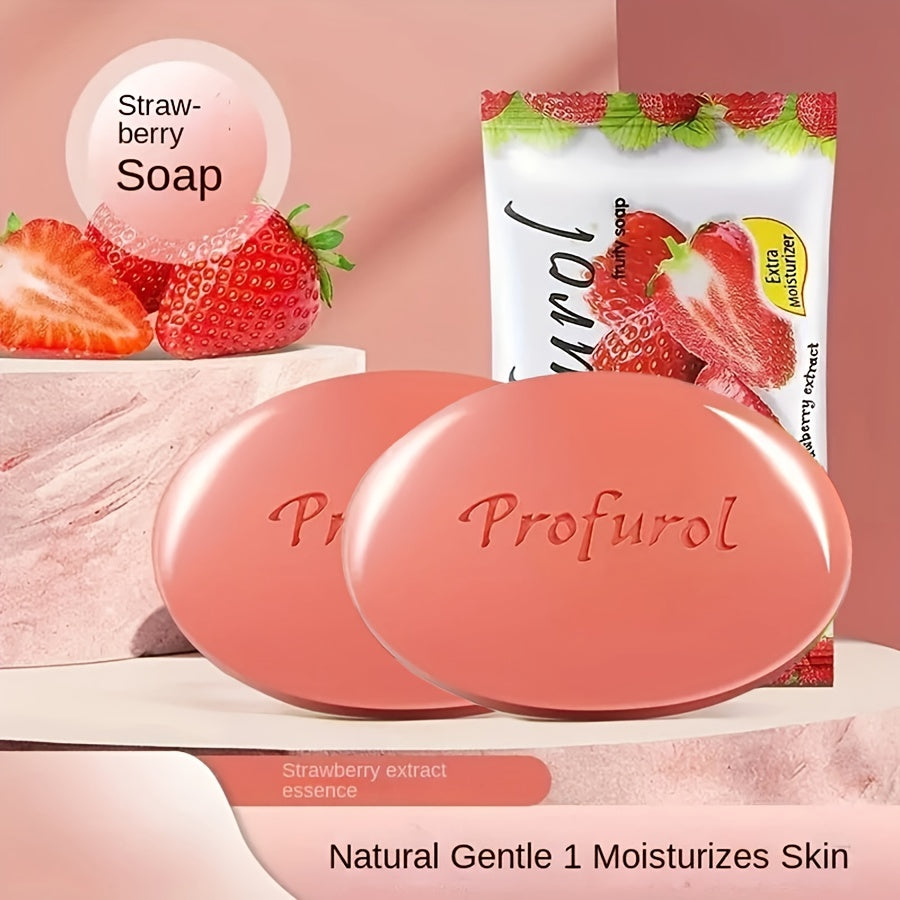 Strawberry scented SHOWLU exfoliating soap bar with vitamin E, featuring a pink soap with strawberry design and textured surface.