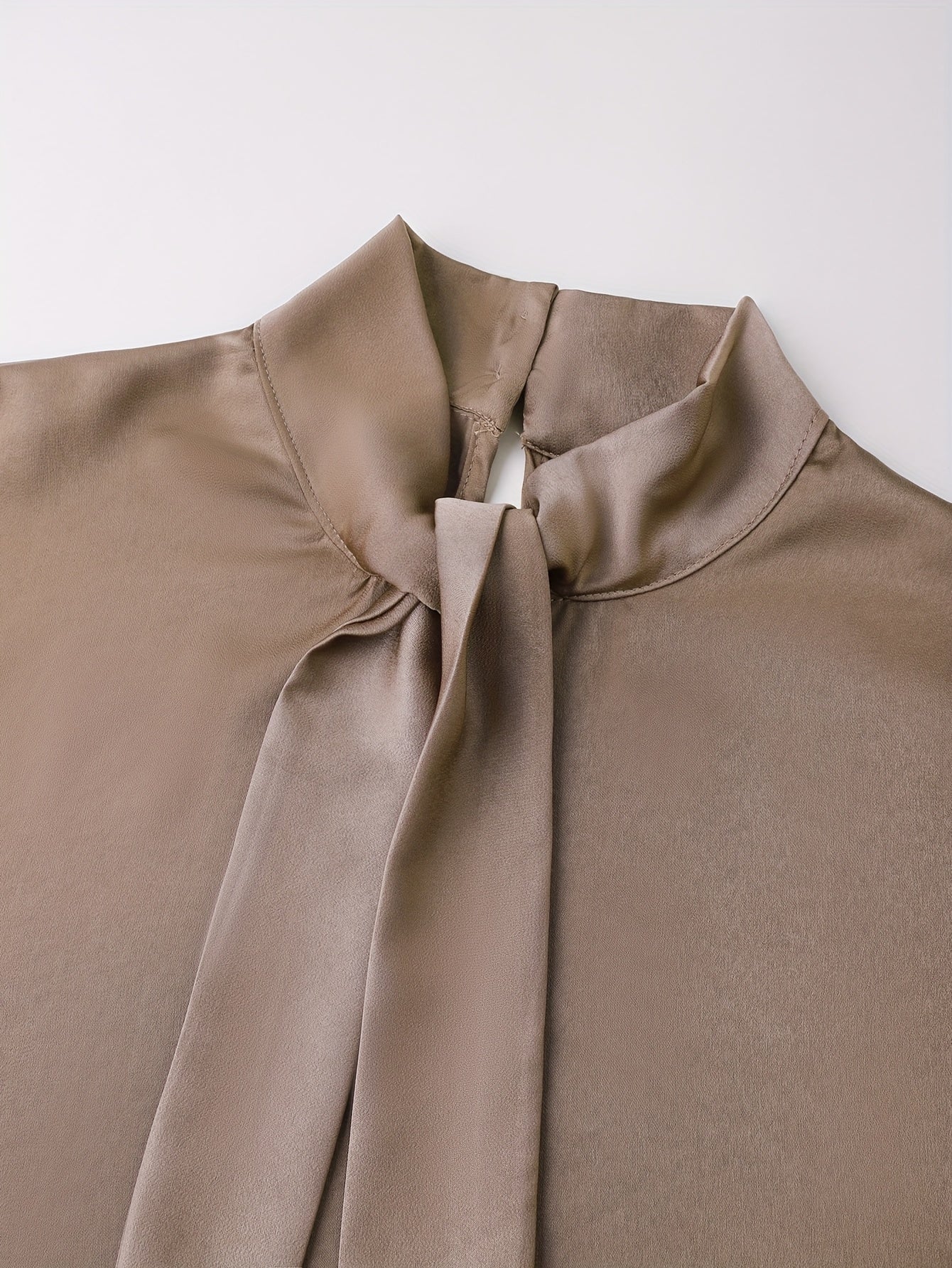 Champagne satin high-neck long sleeve shirt with lace-up front by SHOWLU FASHION, stylish and elegant women's blouse.