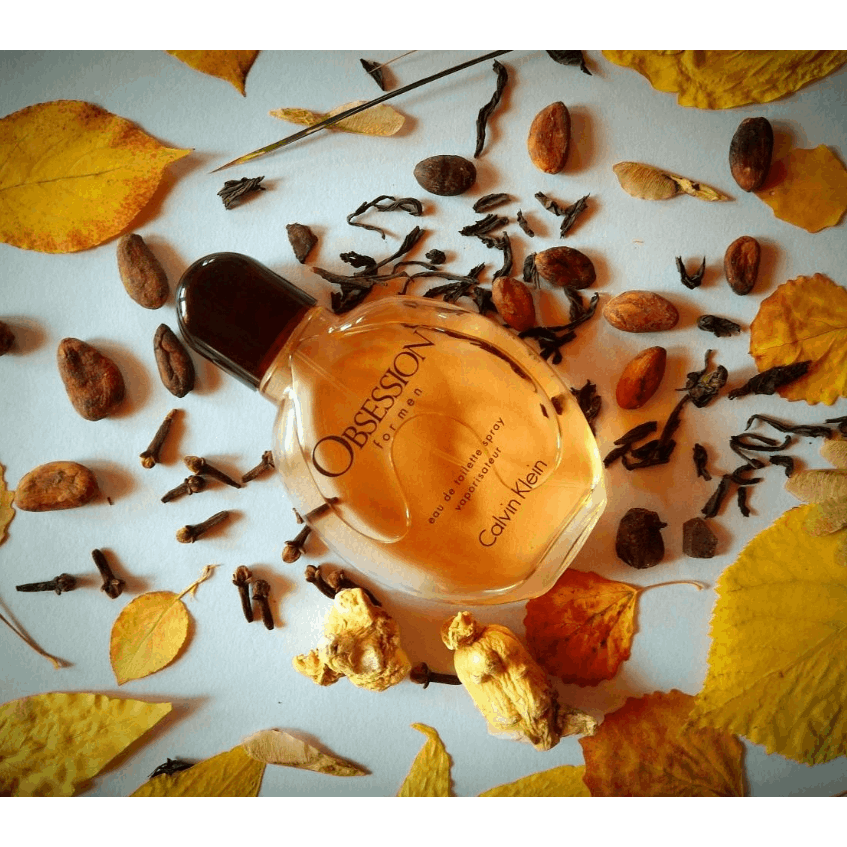 Calvin Klein Obsession for Men Oriental Woody EDT spray bottle with sleek design and dark amber accents.