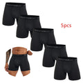 Set of five BONITOS men's boxer shorts in solid polyester spandex, featuring comfortable waistband and classic fit.