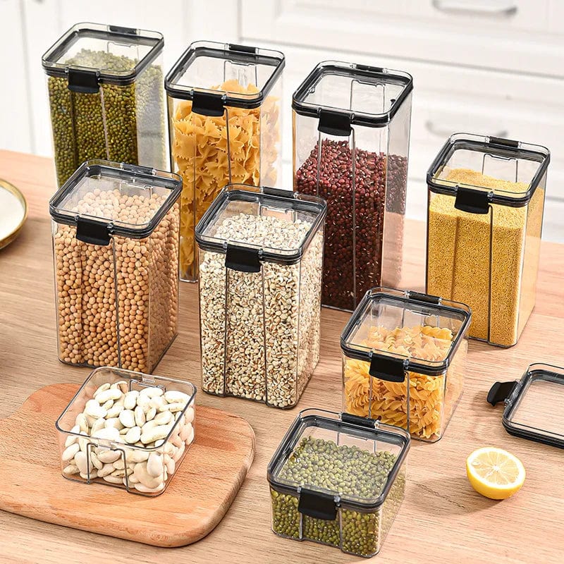Showlu 5-piece acrylic kitchen grain storage jars set with large sealed tanks for organizing spices, grains, and dry foods.