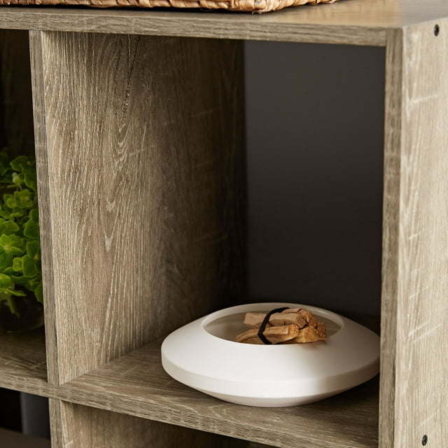 Doba 6-cube storage organizer with vertical and horizontal shelving for books, toys, and home organization.