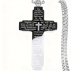 A stainless steel cross pendant necklace engraved with the Lord's Prayer on a silver chain.