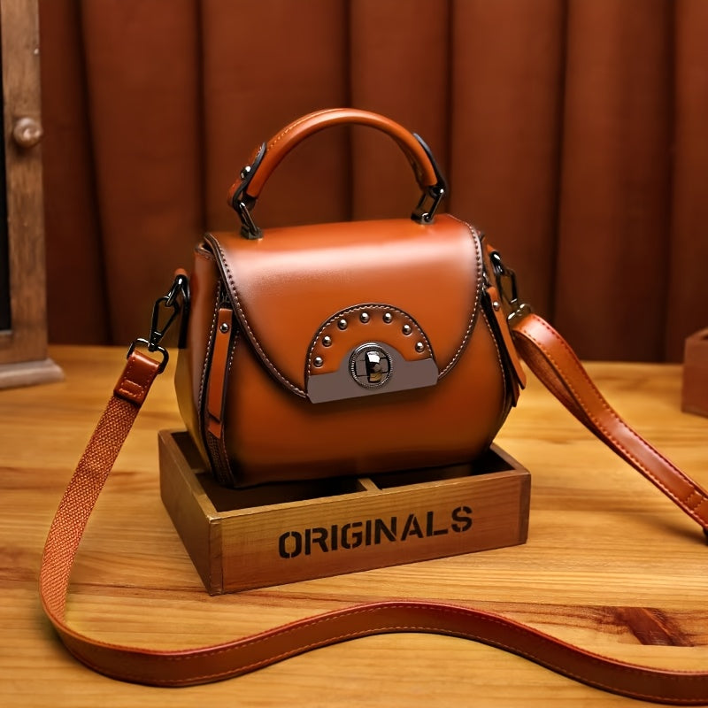 Black PU leather SHOWLU Women's Retro Apple-Shaped Crossbody Bag with adjustable strap and gold-tone hardware.