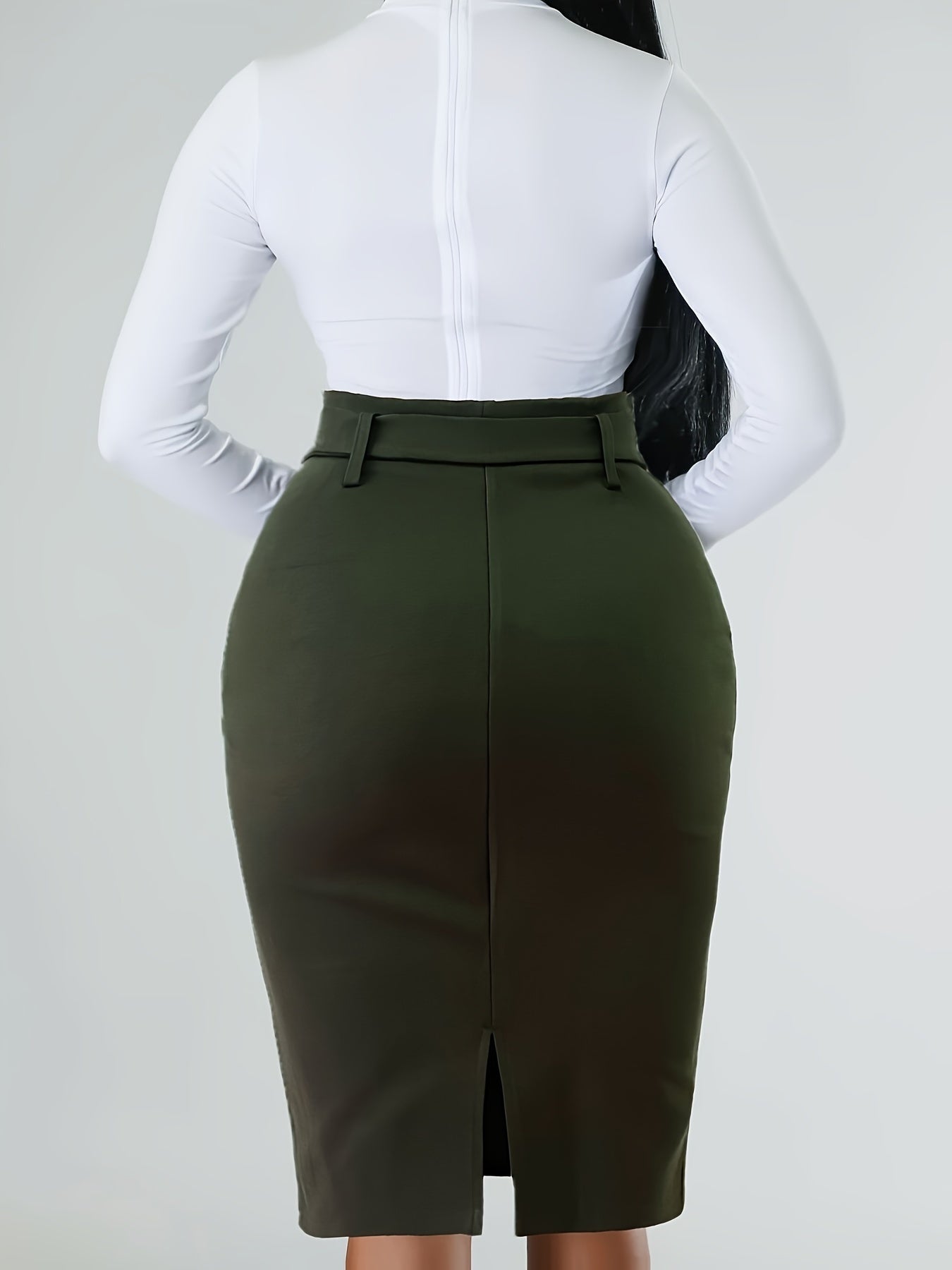 SHOWLU FASHION floral belted bodycon skirt with split back, made of soft jersey knit fabric, shown on a model.