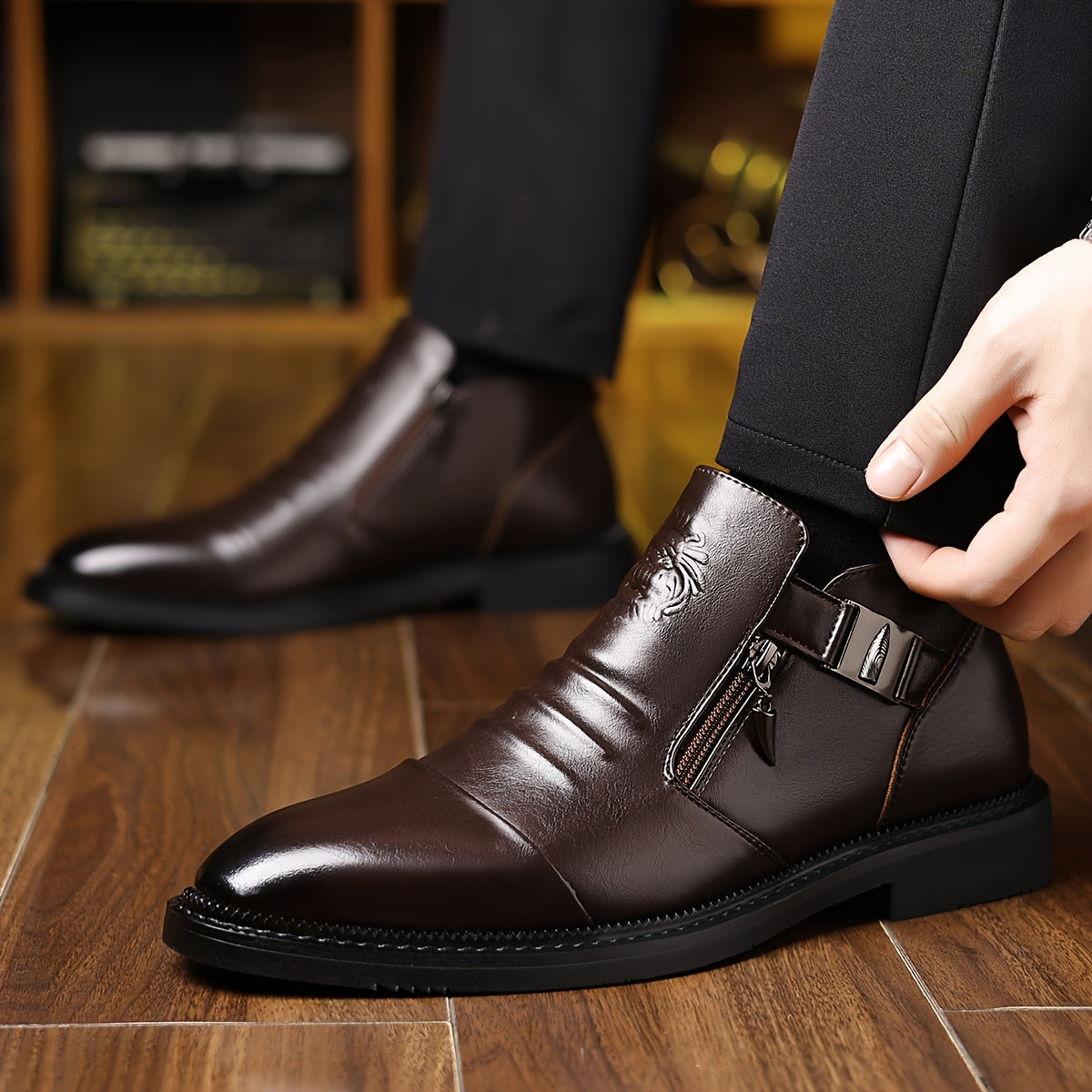 Black embossed lion ankle boots for men in glossy PU leather, featuring stylish design and secure ankle fit.