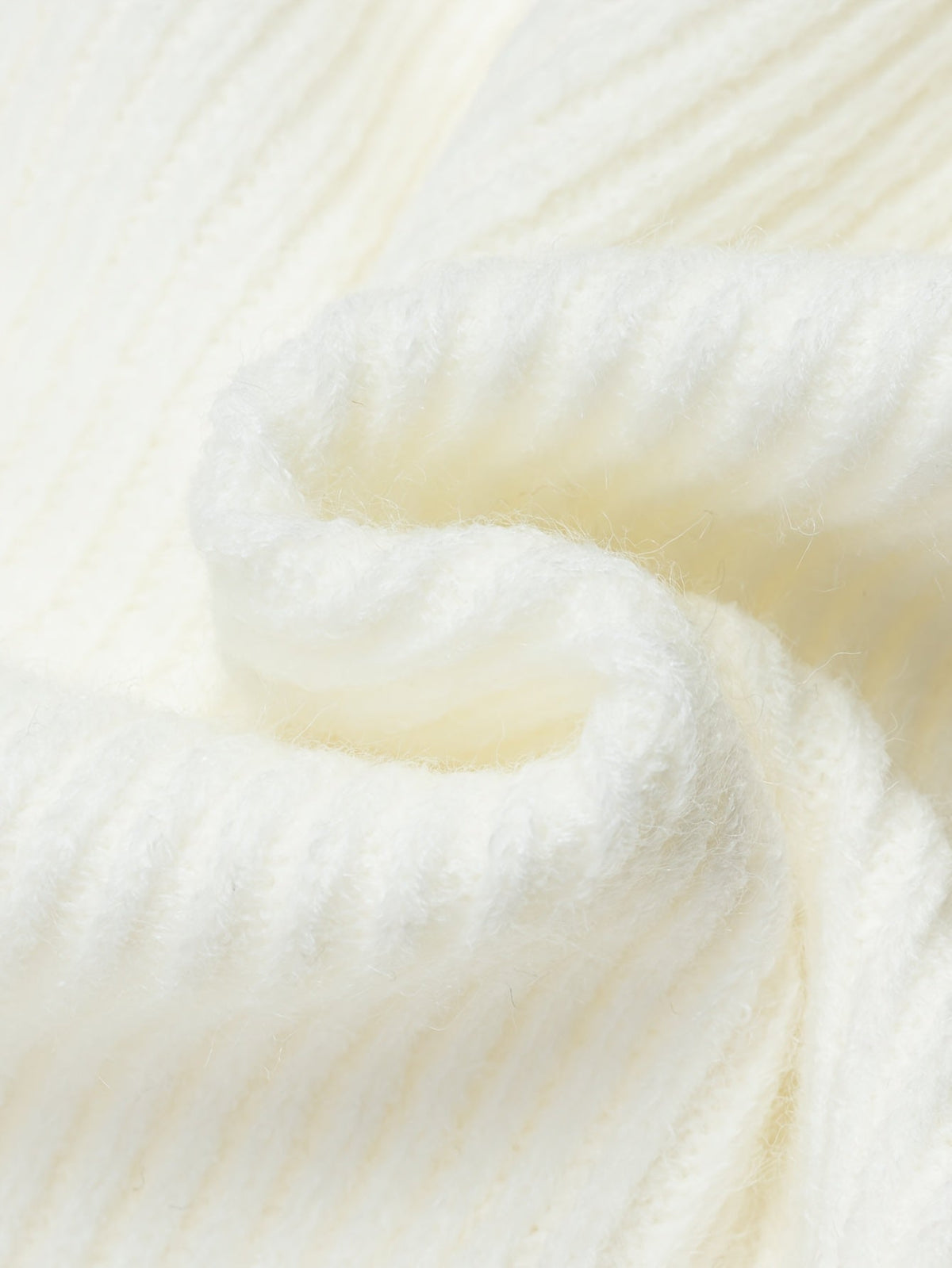 White midi knit skirt by SHOWLU FASHION STORE featuring a high-waisted, elegant design and a smooth, fitted silhouette.