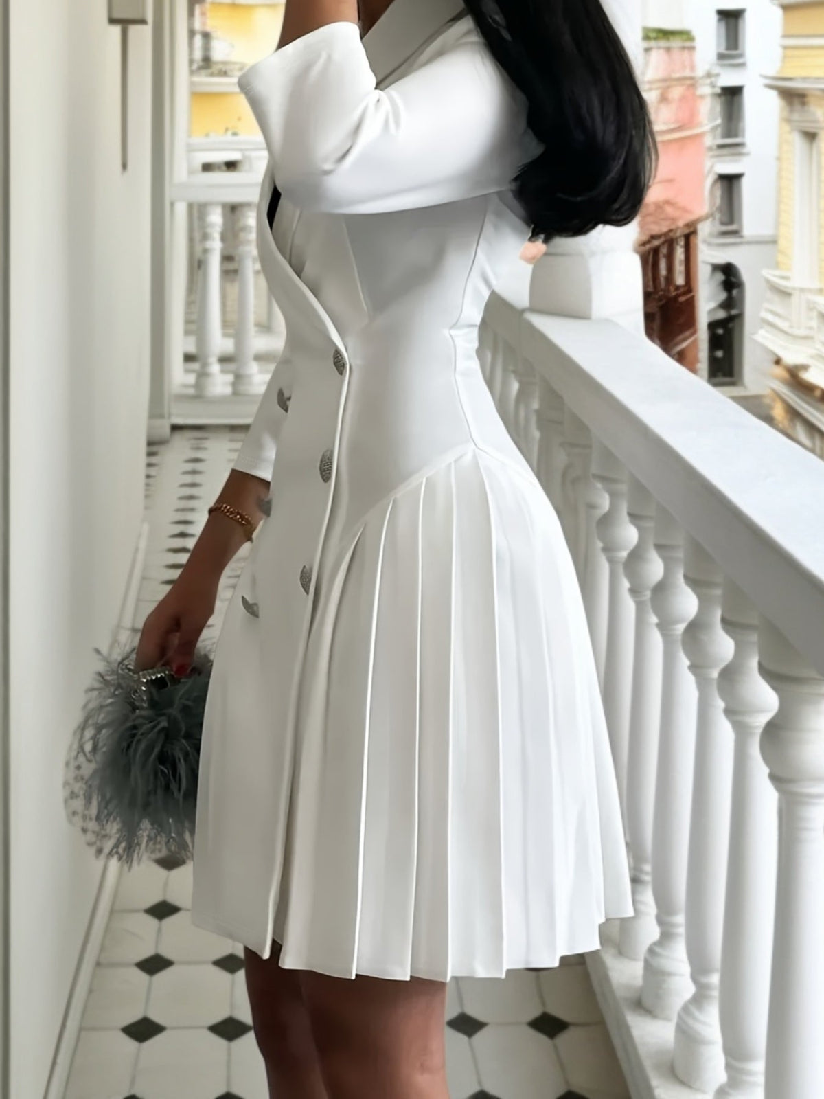 Solid color SHOWLU FASHION women's V-neck pleated A-line dress hanging on a display mannequin.