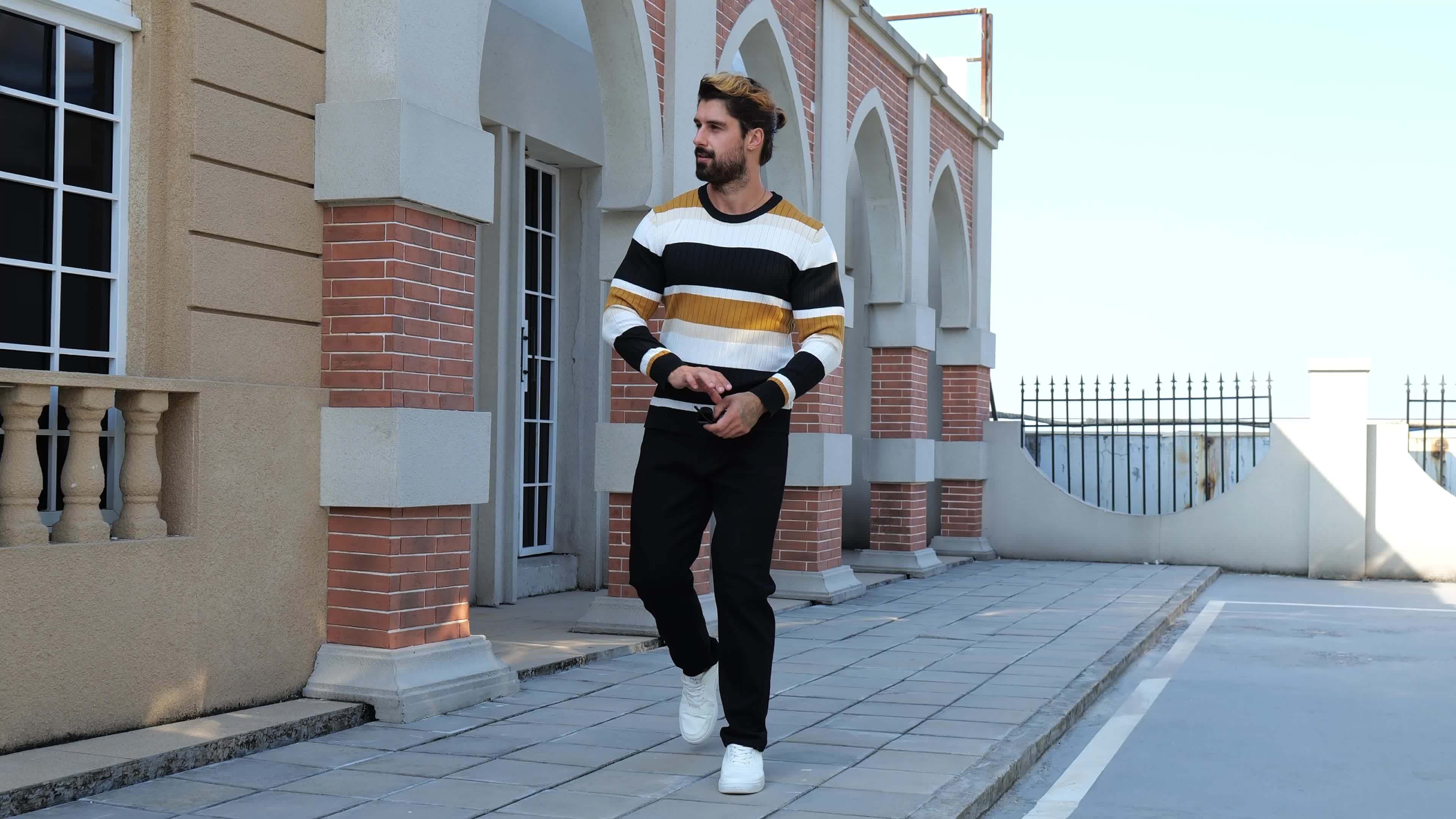 Men's striped ribbed knit sweater with long sleeves and crew neck by SHOWLU FASHION STORE, showcasing a casual pullover style.