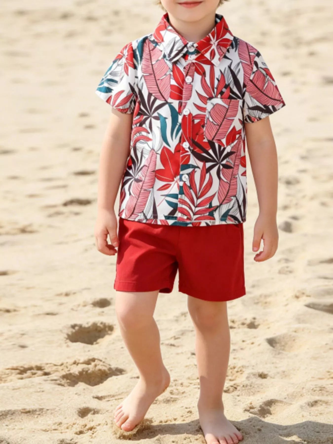 Children's tropical leaf print shirt and shorts set by Trendsi, featuring vibrant green leaf patterns on lightweight fabric.