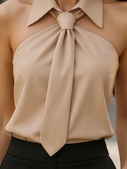 Elegant Beige Sleeveless Tie-Neck Blouse with Ruffled Hem - Chic Solid Color Shirt for Women, Perfect for Travel & Vacation Outfits, Versatile Fashion Piece, Sophisticated Design, Highquality Fabric