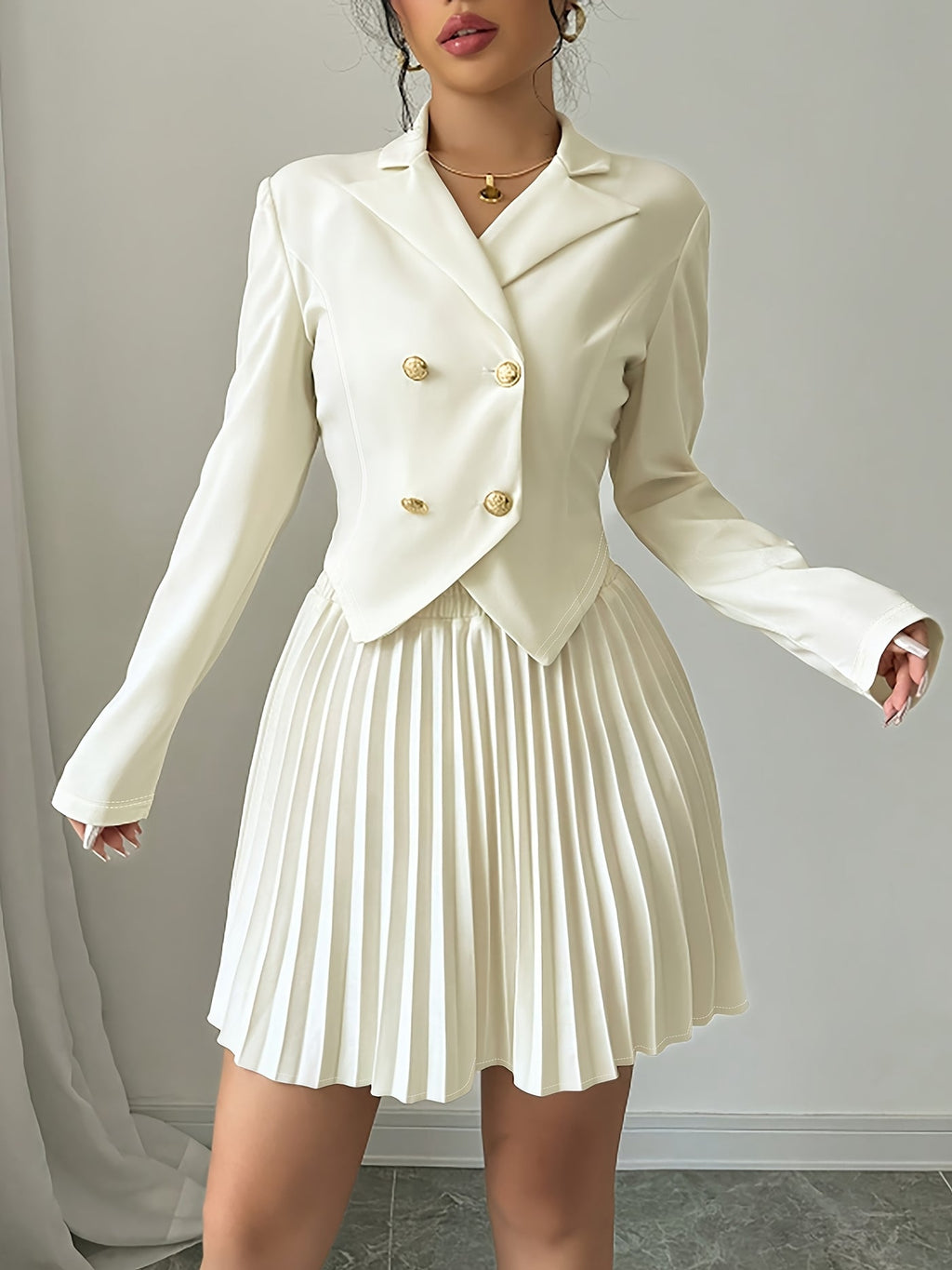 SHOWLU Women's double-breasted lapel suit jacket and pleated skirt set, stylish formal outfit with tailored blazer and flowing skirt.