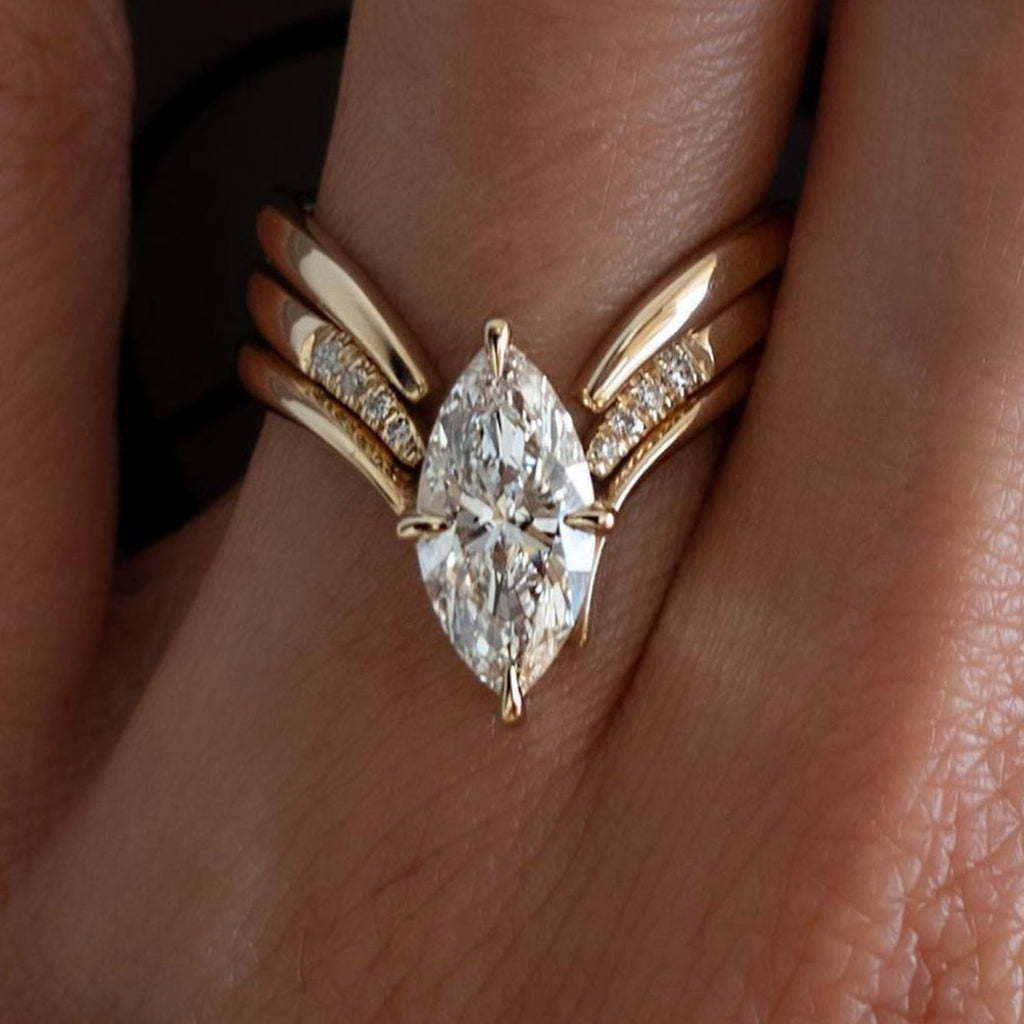 Showlu Fashion 2CT marquise moissanite ring in 18K gold plated S925 silver, featuring a sparkling marquise-shaped gemstone.