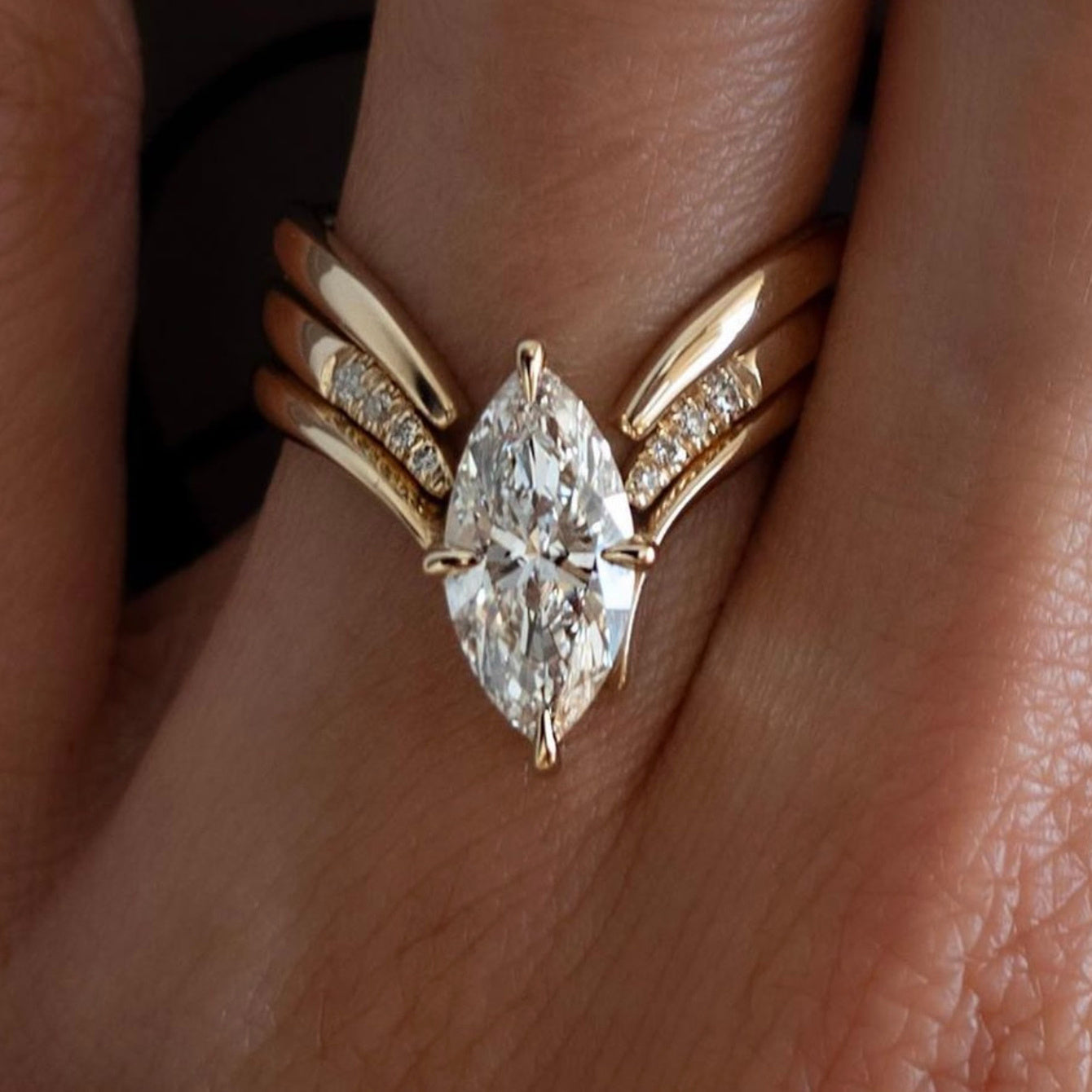Showlu Fashion 2CT marquise moissanite ring in 18K gold plated S925 silver, featuring a sparkling marquise-shaped gemstone.