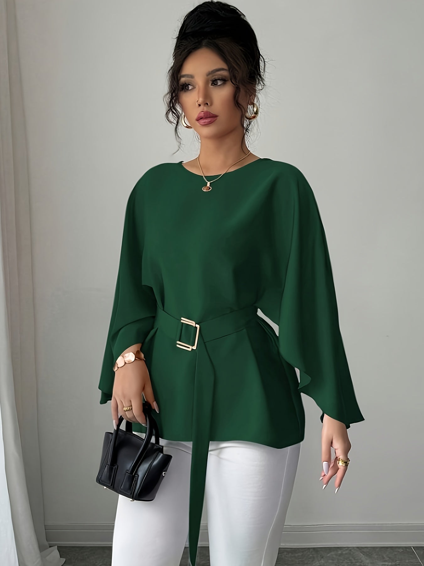 Light blue SHOWLU FASHION long sleeve belted blouse with crew neck, elegant design and fitted silhouette.