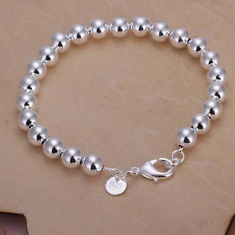 18K gold and sterling silver bracelet with 5mm sideways chain, designed for women and men, stylish jewelry for special occasions.