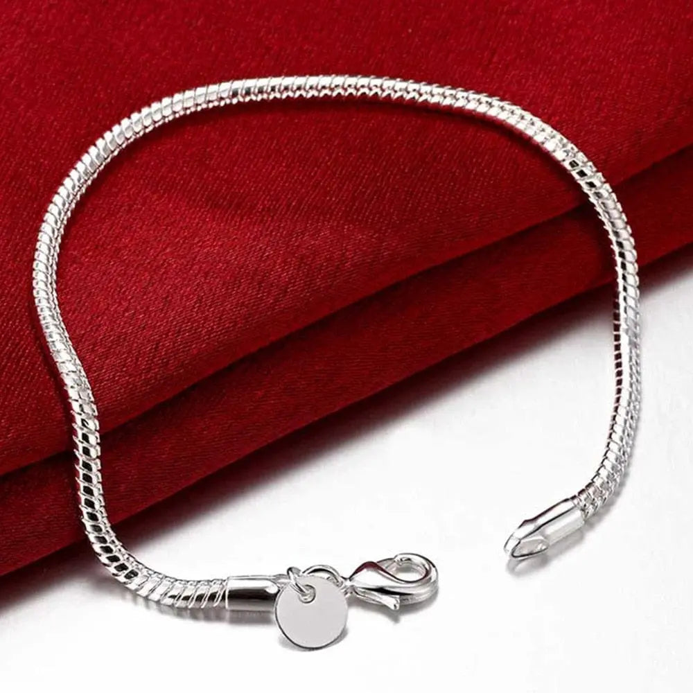 18K gold sideways chain bracelet by Anel Demosthene, 8 inches, 5mm width, sterling silver design for women and men.