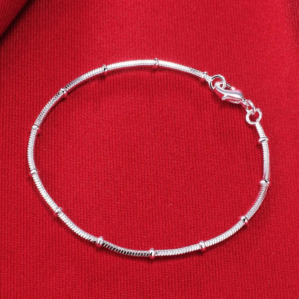 18K gold sideways chain bracelet with 5mm links, crafted in sterling silver, suitable for women and men, stylish jewelry piece