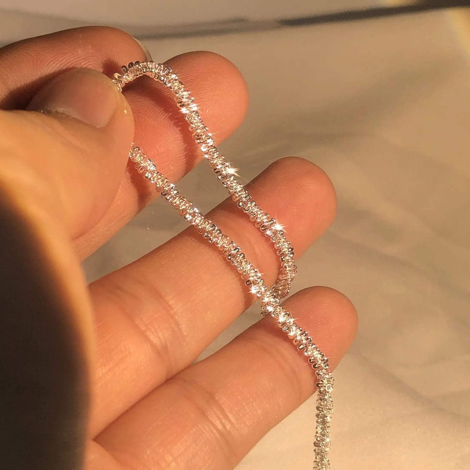 18K gold and sterling silver Anel Demosthene sideways chain bracelet, 8-inch, 5mm width, unisex jewelry for fashion or special occasions.